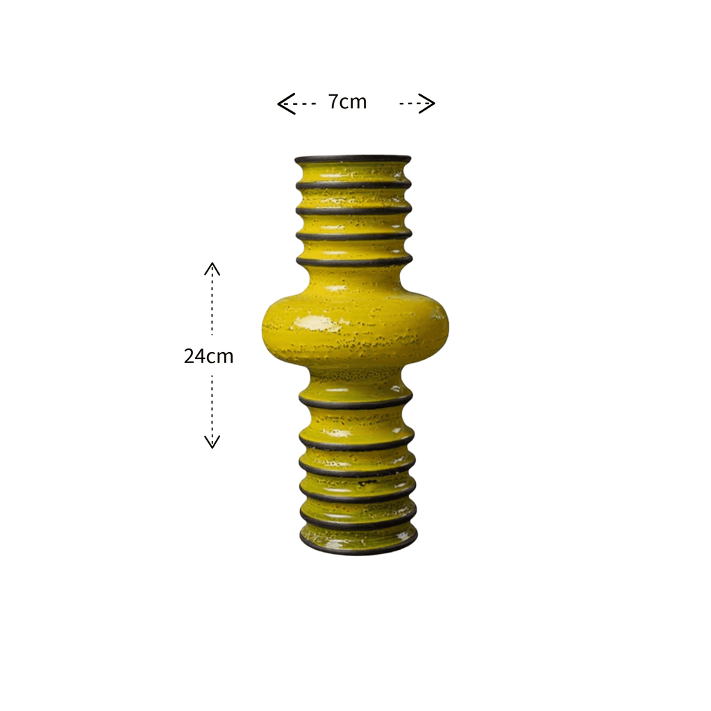 A yellow ribbed ceramic vase with a bulbous center, shown on a white background with dimension arrows indicating a height of 24cm and a neck width of 7cm.