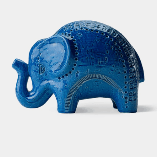 The Bitossi Figura Elefante Medium is a handcrafted ceramic sculpture designed by Aldo Londi. Finished in the iconic Rimini Blu turquoise glaze with engraved geometric detailing, this Italian-made decorative elephant celebrates the timeless artistry and craftsmanship of the renowned Bitossi archive.