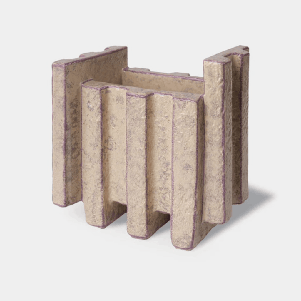 The Bitossi Patricia Urquiola Merlate Medium Cream Vase is a sculptural ceramic vase crafted from white clay and finished in a refined cream glaze. Featuring an architectural textured surface and an asymmetric silhouette, it makes an elegant decorative statement for shelves, dining tables, consoles and contemporary interiors.