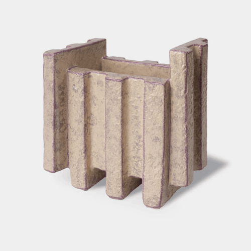 The Bitossi Patricia Urquiola Merlate Medium Cream Vase is a sculptural ceramic vase crafted from white clay and finished in a refined cream glaze. Featuring an architectural textured surface and an asymmetric silhouette, it makes an elegant decorative statement for shelves, dining tables, consoles and contemporary interiors.