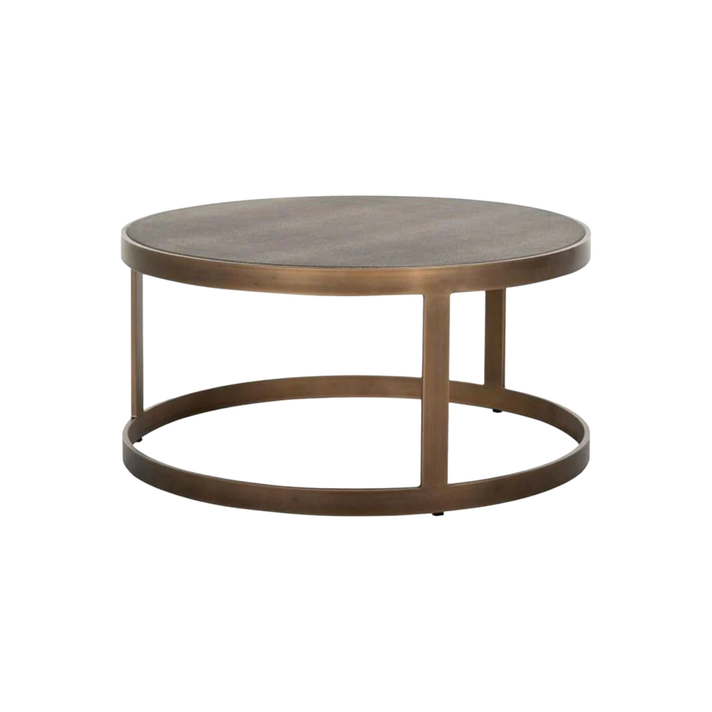 Round metal coffee table with a bronze finish on a white background