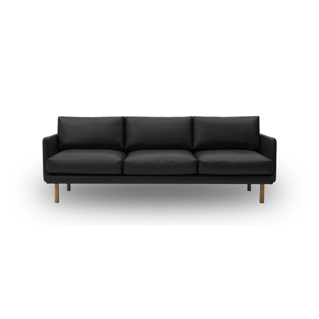Scandinavian leather sofa with oak frame, Oeko-Tex certified cushions, and handcrafted Danish design by Bruunmunch.