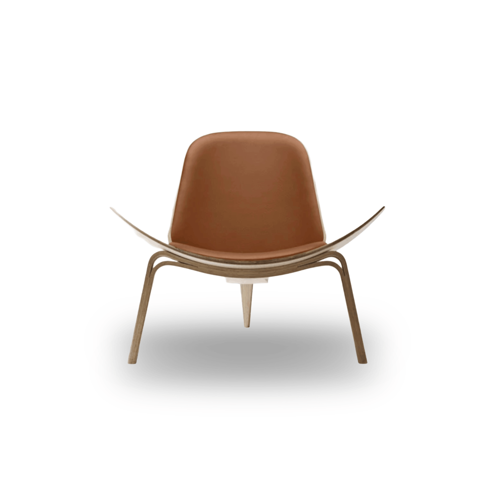 Designed by Hans J. Wegner, the CH07 Shell Chair features a form-pressed veneer shell, leather upholstery, and iconic Scandinavian styling.