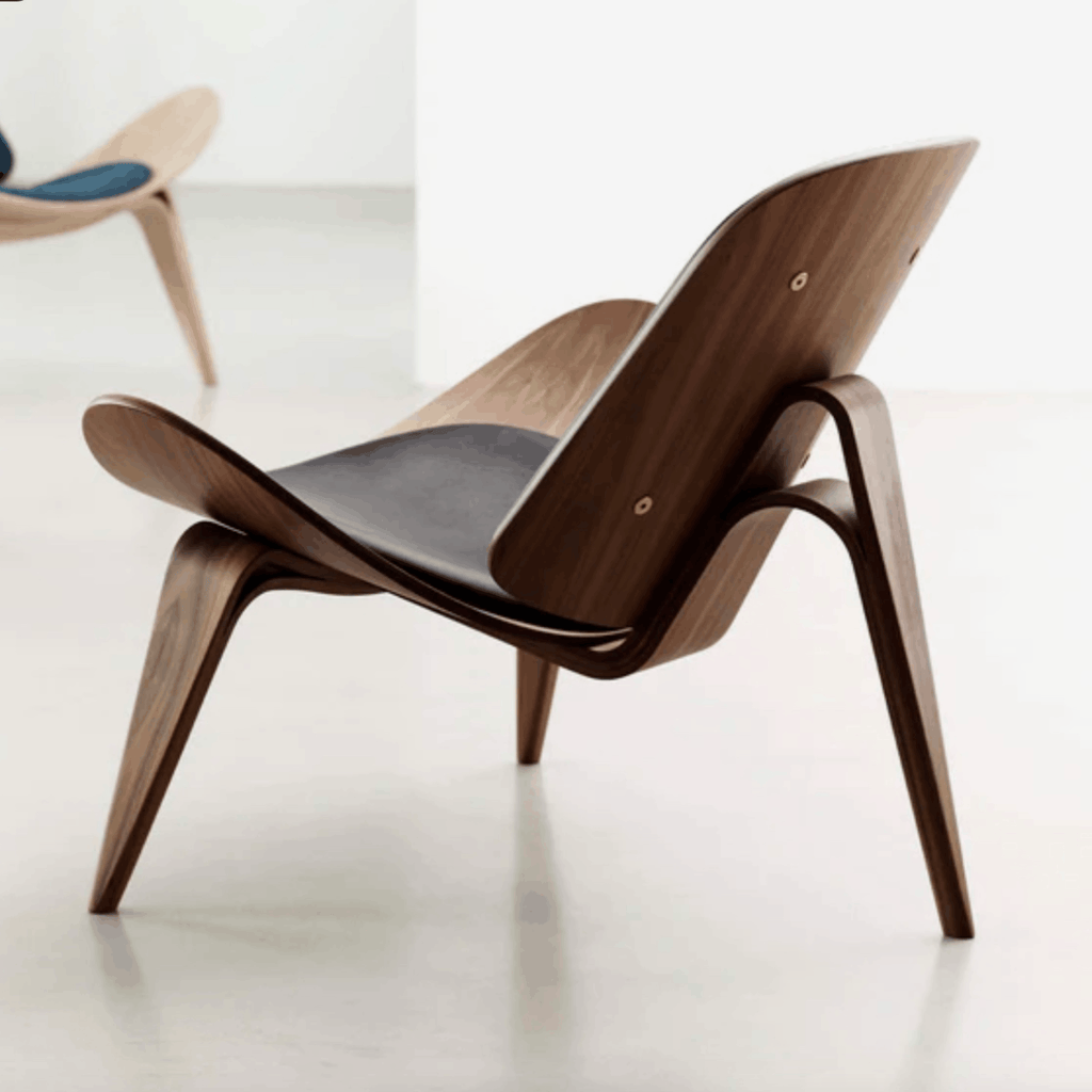 Modern wooden chair with a minimalist design on a white background