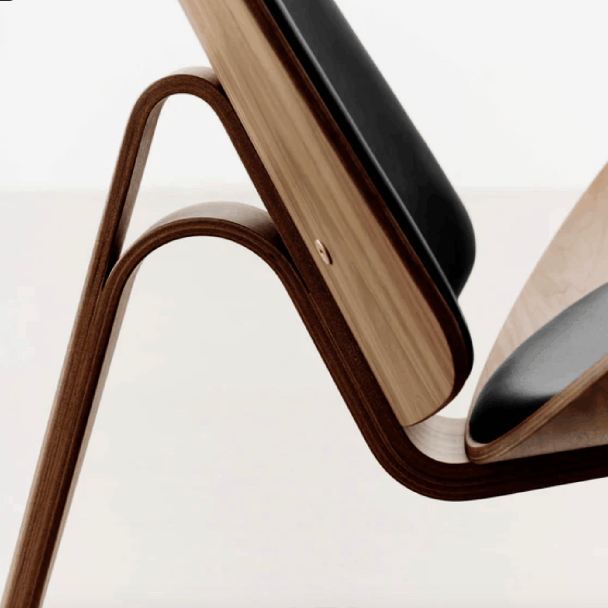 Wooden chair with a minimalist design on a white background
