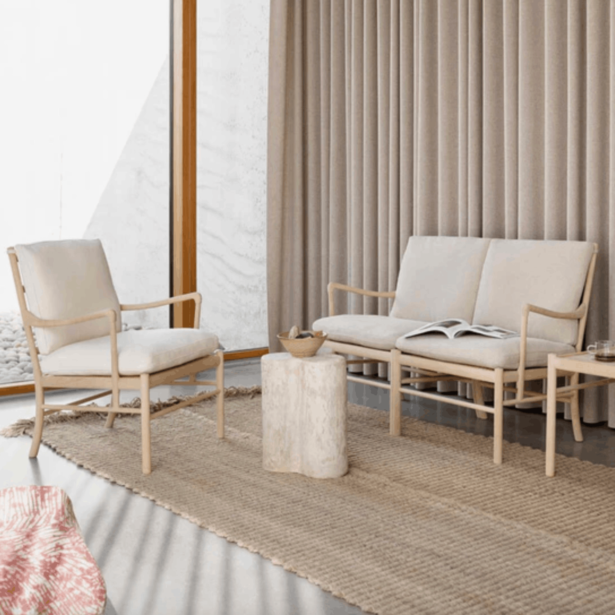 A beautifully crafted oak sofa with soft Re-wool upholstery, bringing understated luxury and enduring comfort to contemporary interiors.