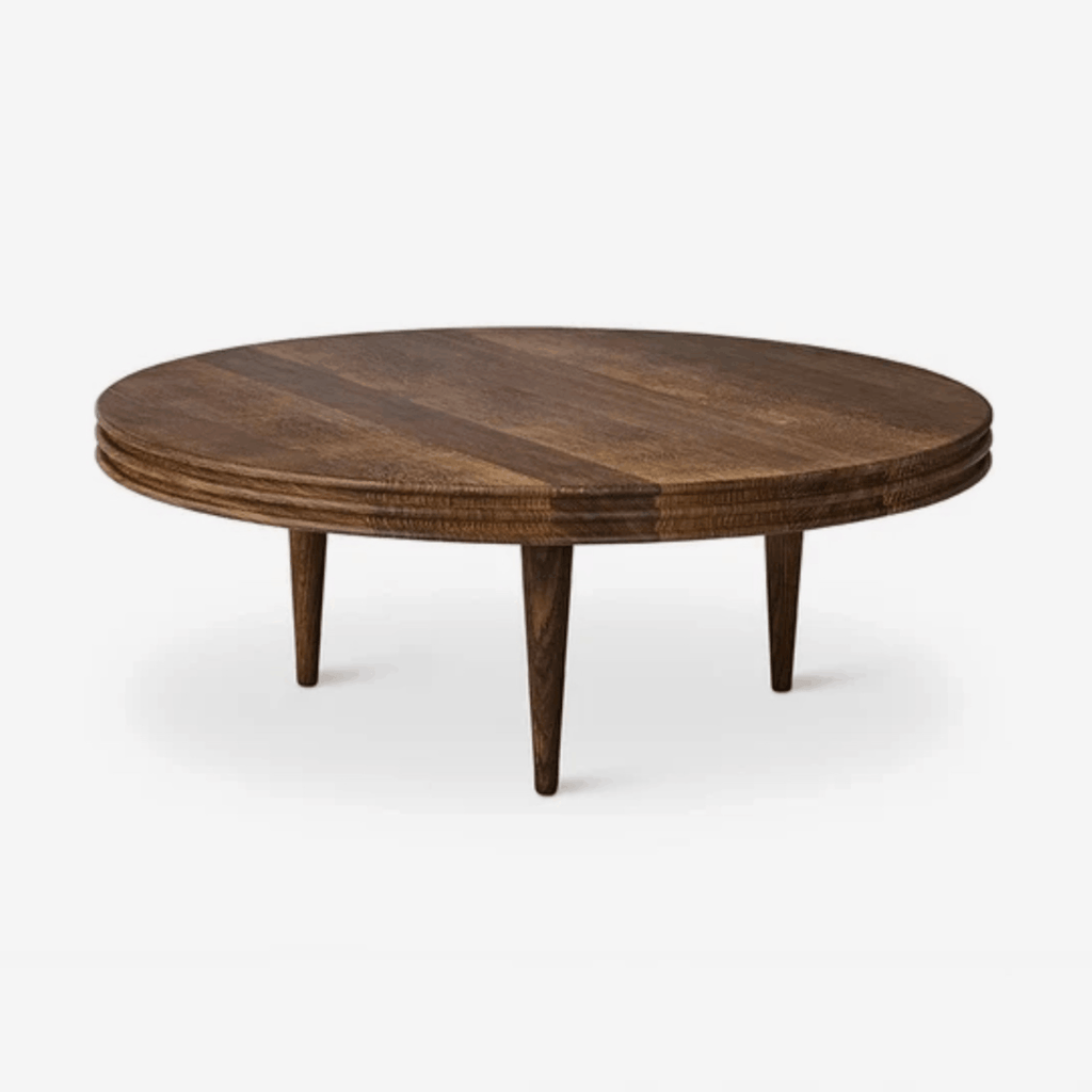 DK3 Groove Round Coffee Table in walnut with a thick circular tabletop, finely milled grooved edge and slender conical wooden legs.