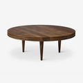 DK3 Groove Round Coffee Table in walnut with a thick circular tabletop, finely milled grooved edge and slender conical wooden legs.