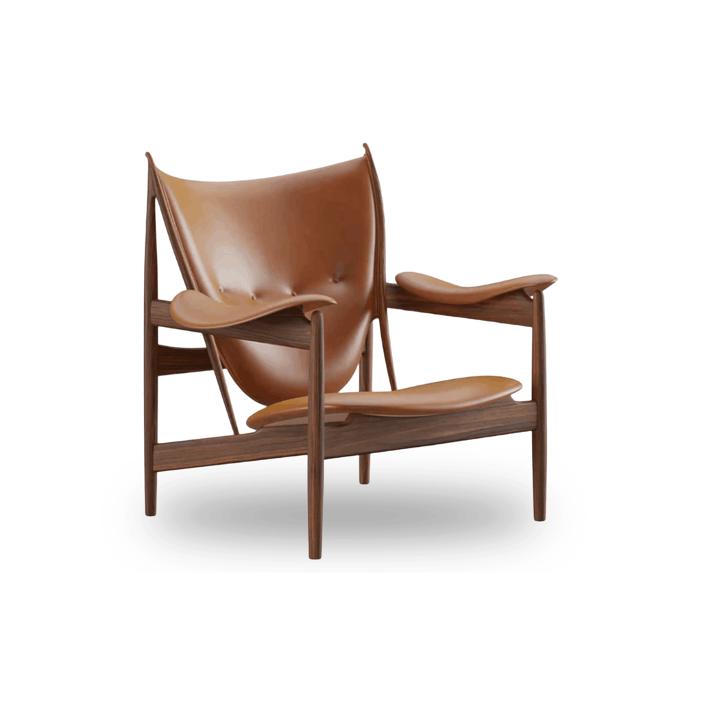 Designed by Finn Juhl, the Chieftain Chair features a solid oak frame, luxurious upholstery, and one of the most celebrated forms in Scandinavian furniture design.