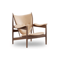 Designed by Finn Juhl, the Chieftain Chair features a solid oak frame, luxurious upholstery, and one of the most celebrated forms in Scandinavian furniture design.