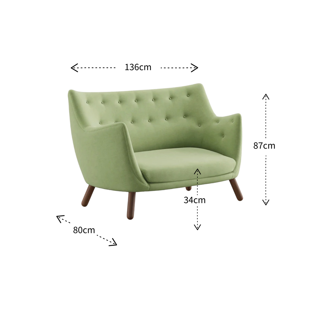 A light green tufted armchair with dark wooden legs, shown with dimension arrows and labels indicating width 136cm, height 87cm, depth 34cm, and leg width 80cm on a white background.