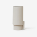 The Form & Refine Alcoa Vase is a handcrafted Portuguese stoneware vase designed by Herman Studio. Featuring a matt grey exterior, glossy grey glazed interior and clean Scandinavian lines, it makes an elegant centrepiece, decorative vase or stylish kitchen utensil holder.