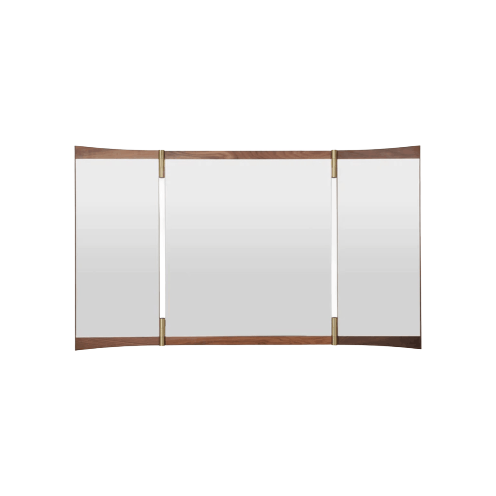 The GUBI Vanity Wall Mirror – Triple Mirror by GamFratesi combines walnut veneer, solid brass hinges and adjustable mirror panels in a beautifully sculptural Scandinavian design.