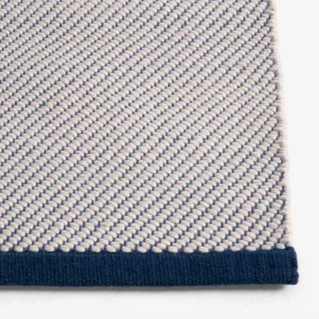 Contemporary wool rug by HAY with a refined diagonal weave, two-tone effect, and OEKO-TEX® STANDARD 100 certification.