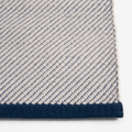 Contemporary wool rug by HAY with a refined diagonal weave, two-tone effect, and OEKO-TEX® STANDARD 100 certification.