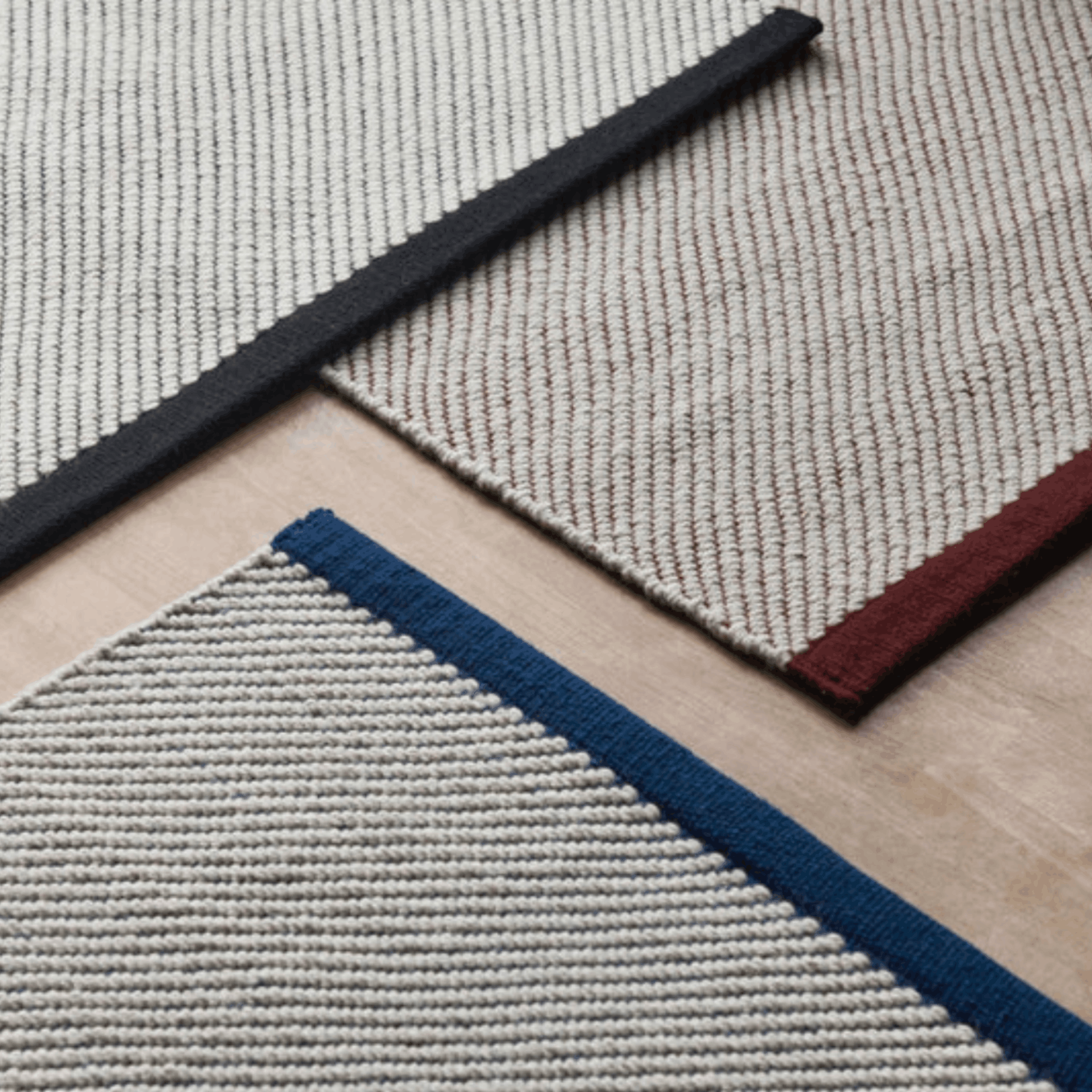 Contemporary wool rugs by HAY with a refined diagonal weave, two-tone effect, and OEKO-TEX® STANDARD 100 certification.