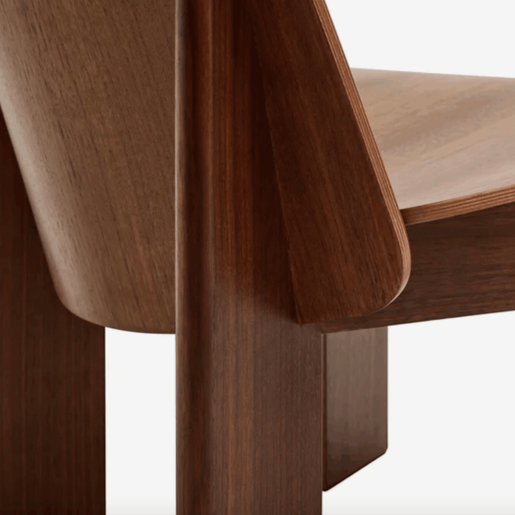 Close-up of a wooden chair with a white background