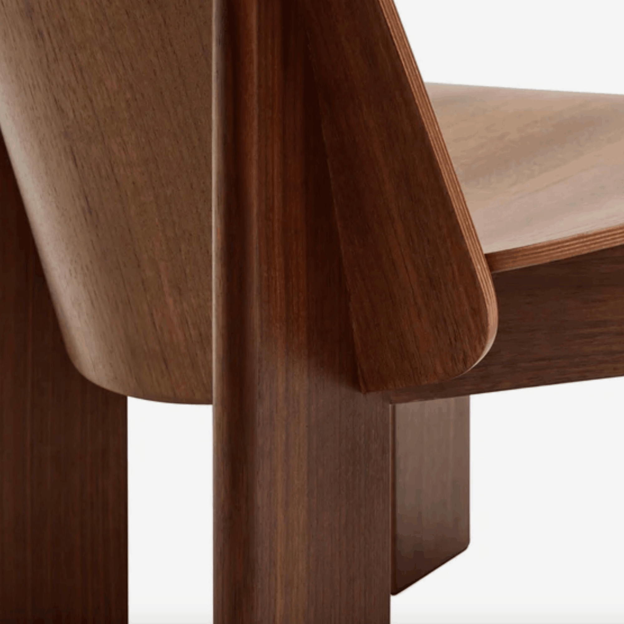 Close-up of a wooden chair with a white background