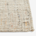 Contemporary HAY rug crafted from New Zealand wool and viscose, featuring a refined neutral weave with delicate multicoloured accents.