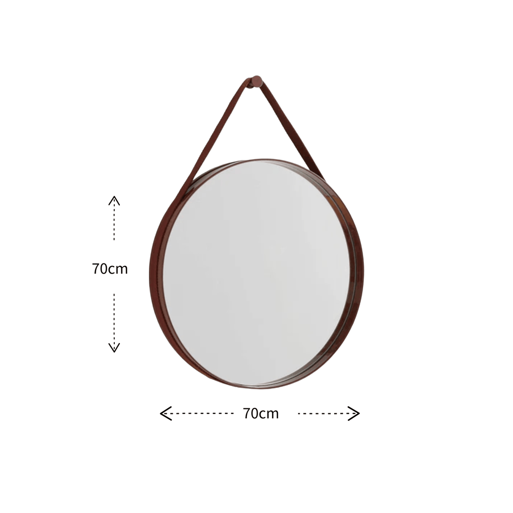A contemporary round wall mirror by HAY featuring a minimalist steel strap design, perfect for bedrooms, bathrooms, and hallways.