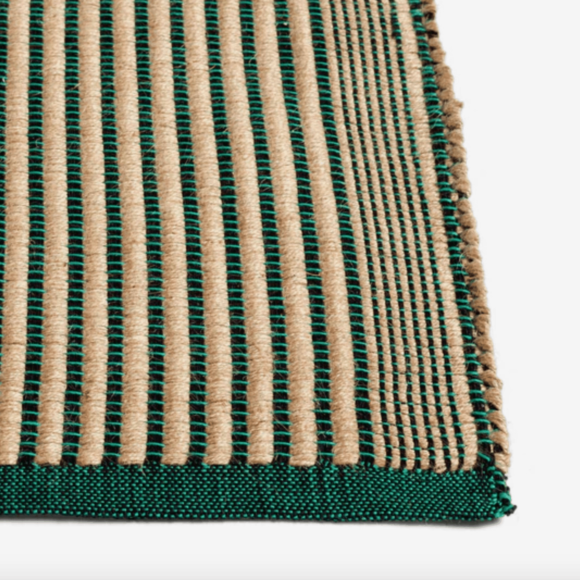 Handwoven by HAY, the Tapis Rug features a durable jute and cotton blend with a non-slip backing for modern living spaces.