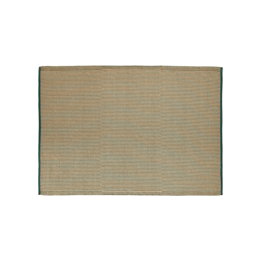 Handwoven by HAY, the Tapis Rug features a durable jute and cotton blend with a non-slip backing for modern living spaces.