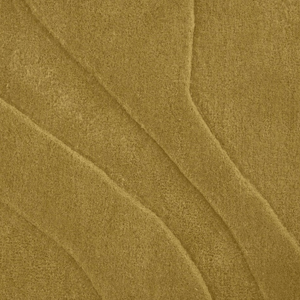 Close-up of a textured mustard fabric surface of a Lignet Roset Gavrinis rug