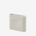 The Muuto Ridge Vase is a contemporary earthenware vase featuring a distinctive sculptural silhouette and innovative central indentation that supports floral arrangements while doubling as a practical handle. Its compact size makes it ideal for shelves, side tables, consoles and modern Scandinavian interiors.