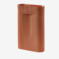 The Muuto Ridge Vase is a contemporary earthenware vase featuring a distinctive sculptural silhouette and innovative central indentation that supports floral arrangements while doubling as a practical handle. Perfect as a statement decorative object or elegant vase for modern Scandinavian interiors.