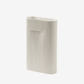 The Muuto Ridge Vase is a contemporary earthenware vase featuring a distinctive sculptural silhouette and innovative central indentation that supports floral arrangements while doubling as a practical handle. Perfect as a statement decorative object or elegant vase for modern Scandinavian interiors.