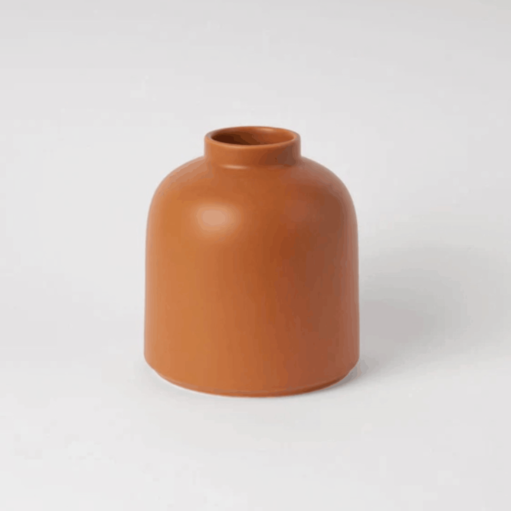 The Raawii Omar Vase is a handcrafted earthenware vase designed by Omar Sosa and made in Portugal. Featuring a sculptural silhouette and beautifully glazed finish, this contemporary decorative vase combines exceptional craftsmanship with modern Scandinavian-inspired design, making it an elegant statement piece for any interior.
