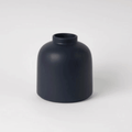 The Raawii Omar Vase is a handcrafted earthenware vase designed by Omar Sosa and made in Portugal. Featuring a sculptural silhouette and beautifully glazed finish, this contemporary decorative vase combines exceptional craftsmanship with modern Scandinavian-inspired design, making it an elegant statement piece for any interior.