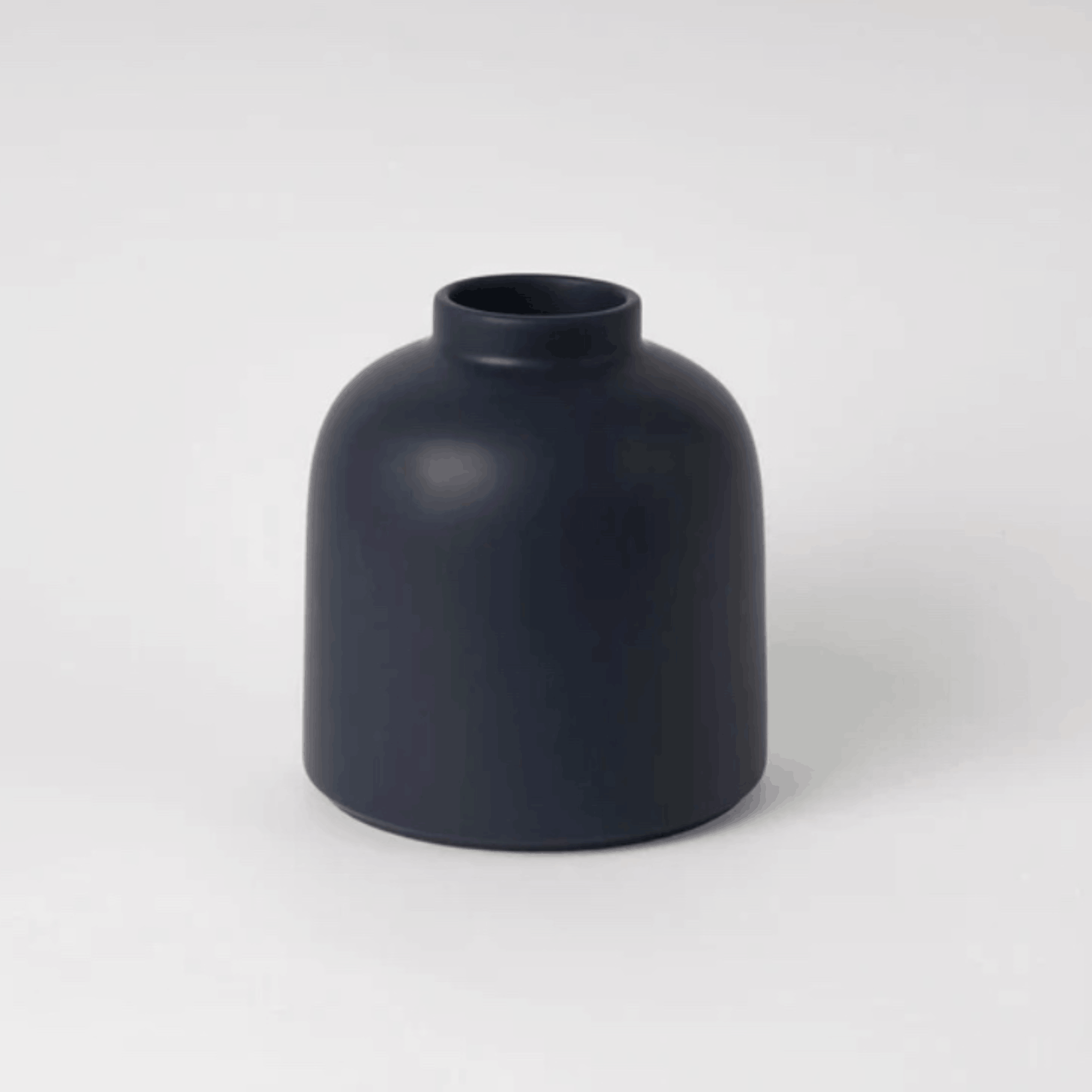 The Raawii Omar Vase is a handcrafted earthenware vase designed by Omar Sosa and made in Portugal. Featuring a sculptural silhouette and beautifully glazed finish, this contemporary decorative vase combines exceptional craftsmanship with modern Scandinavian-inspired design, making it an elegant statement piece for any interior.