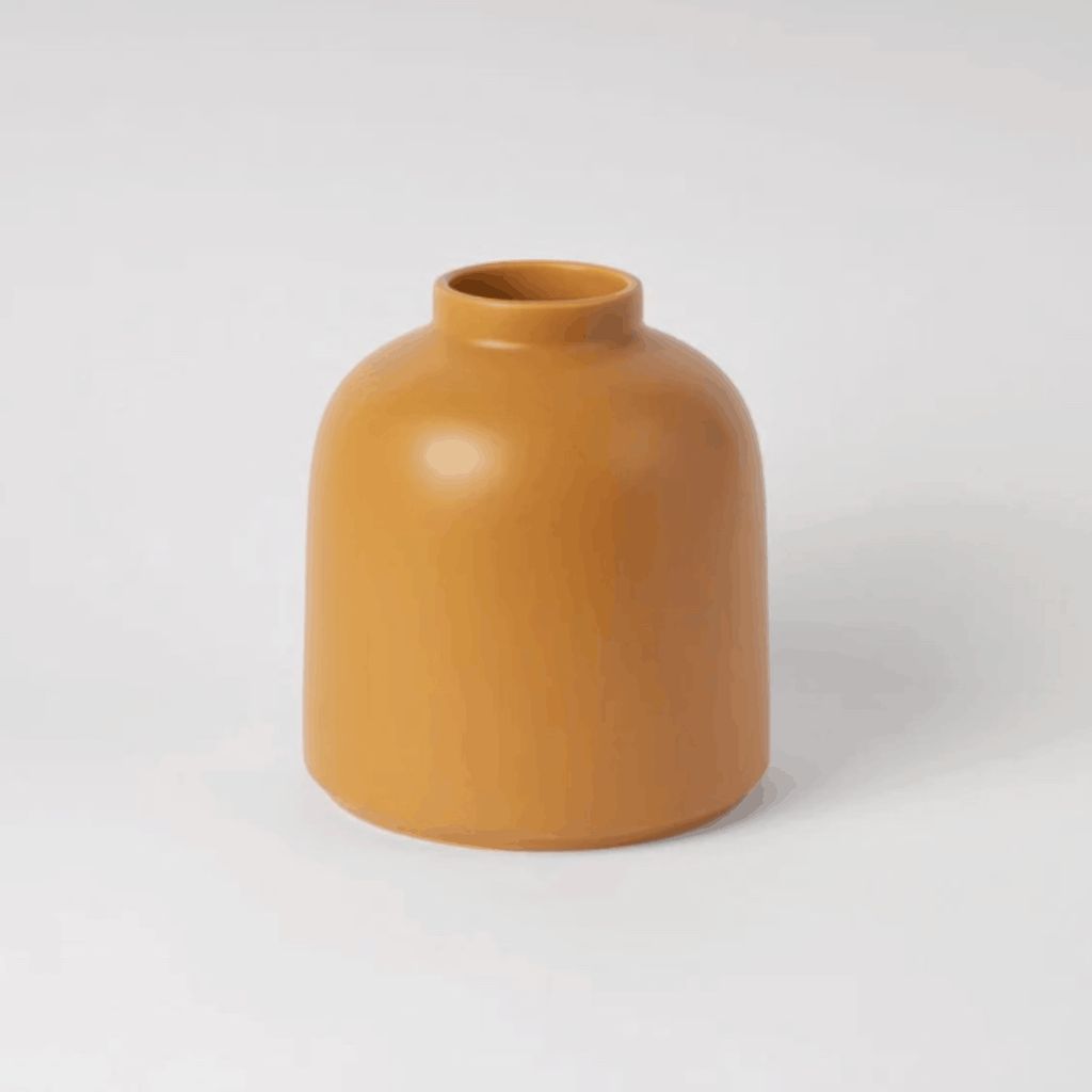 The Raawii Omar Vase is a handcrafted earthenware vase designed by Omar Sosa and made in Portugal. Featuring a sculptural silhouette and beautifully glazed finish, this contemporary decorative vase combines exceptional craftsmanship with modern Scandinavian-inspired design, making it an elegant statement piece for any interior.