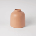 The Raawii Omar Vase is a handcrafted earthenware vase designed by Omar Sosa and made in Portugal. Featuring a sculptural silhouette and beautifully glazed finish, this contemporary decorative vase combines exceptional craftsmanship with modern Scandinavian-inspired design, making it an elegant statement piece for any interior.