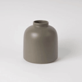 The Raawii Omar Vase is a handcrafted earthenware vase designed by Omar Sosa and made in Portugal. Featuring a sculptural silhouette and beautifully glazed finish, this contemporary decorative vase combines exceptional craftsmanship with modern Scandinavian-inspired design, making it an elegant statement piece for any interior.