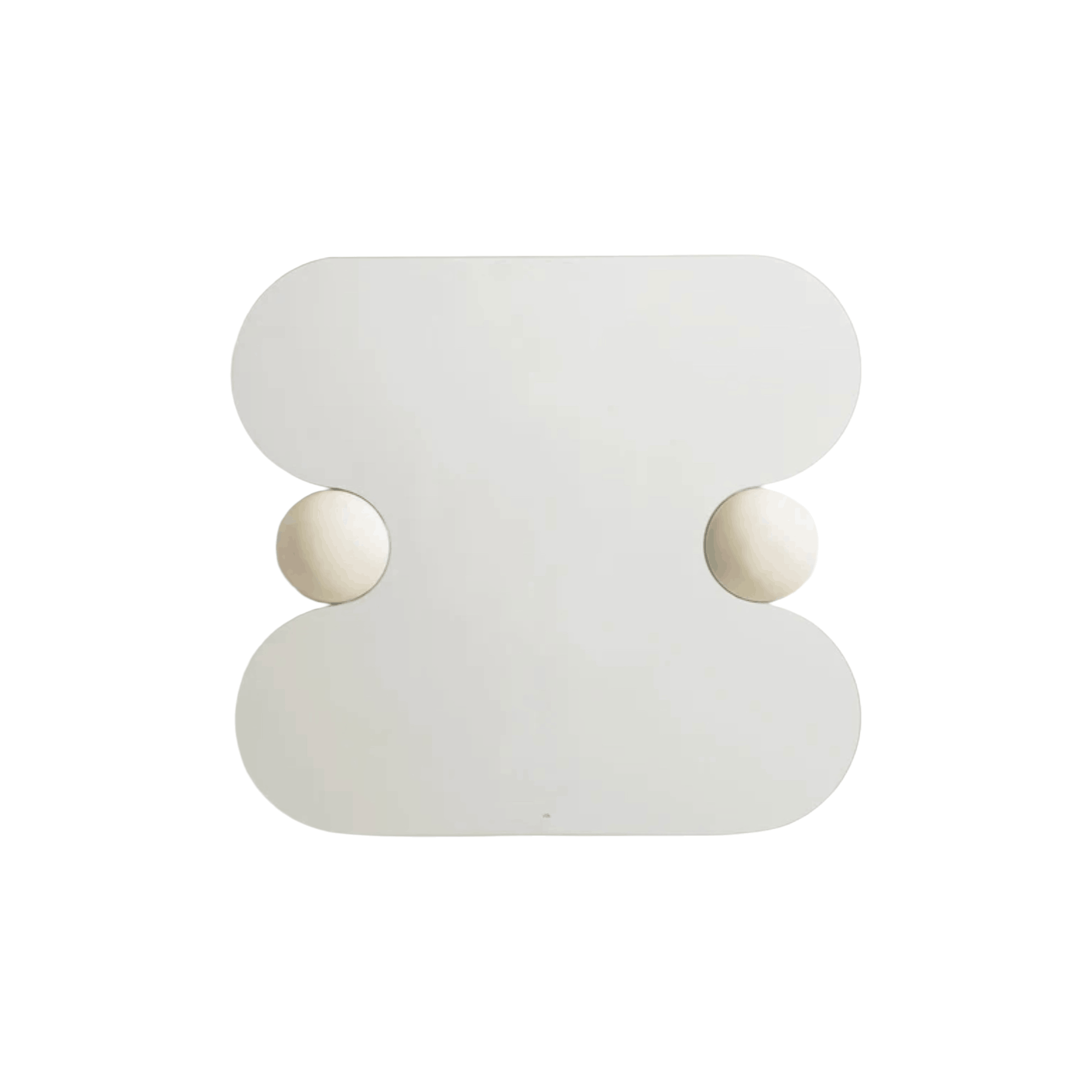The Ready To Hang Squeeze Mirror combines a sculptural silhouette with solid pine detailing, creating a playful contemporary statement for modern interiors.