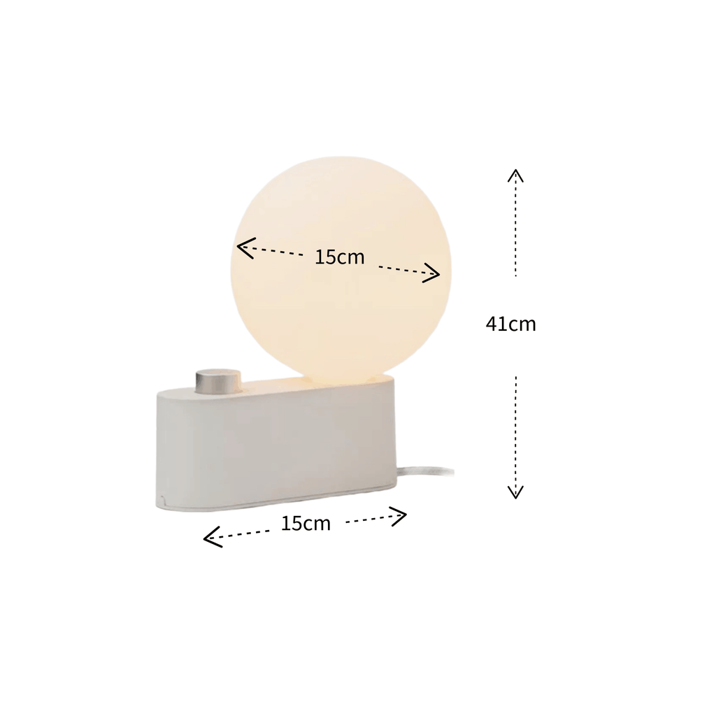 A modern table lamp with a rectangular white base, a round glowing frosted globe, and overlaid dimension arrows showing 15cm width, 15cm height, and 41cm total height on a white background.