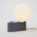 The Tala Alumina Table Lamp is a versatile 2-in-1 designer light that functions as both a table lamp and wall-mounted light. Featuring a minimalist metal construction, fabric cable and mains dimming compatibility, it brings flexible contemporary lighting to modern interiors.