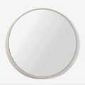A modern round wall mirror with an architectural three-dimensional profile, designed by Sarah Rousselle for The Conran Shop.