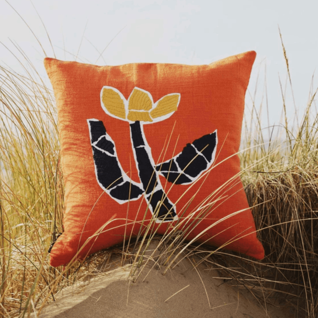 Contemporary cotton cushion cover with a screen-printed floral design by Charlie Sheppard, bringing colour and texture to modern interiors.