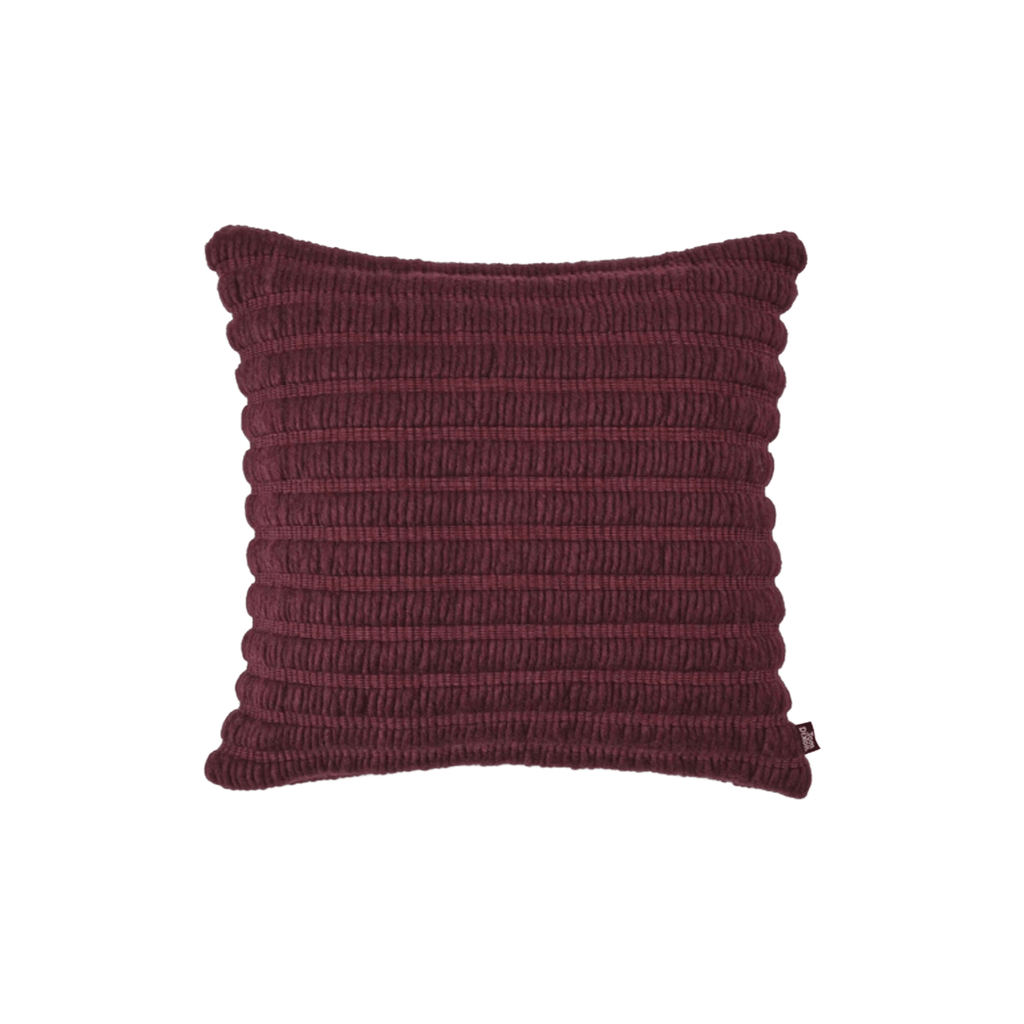 Luxury decorative cushion by Tom Dixon, handcrafted from New Zealand wool and cotton with a textured ridged design.