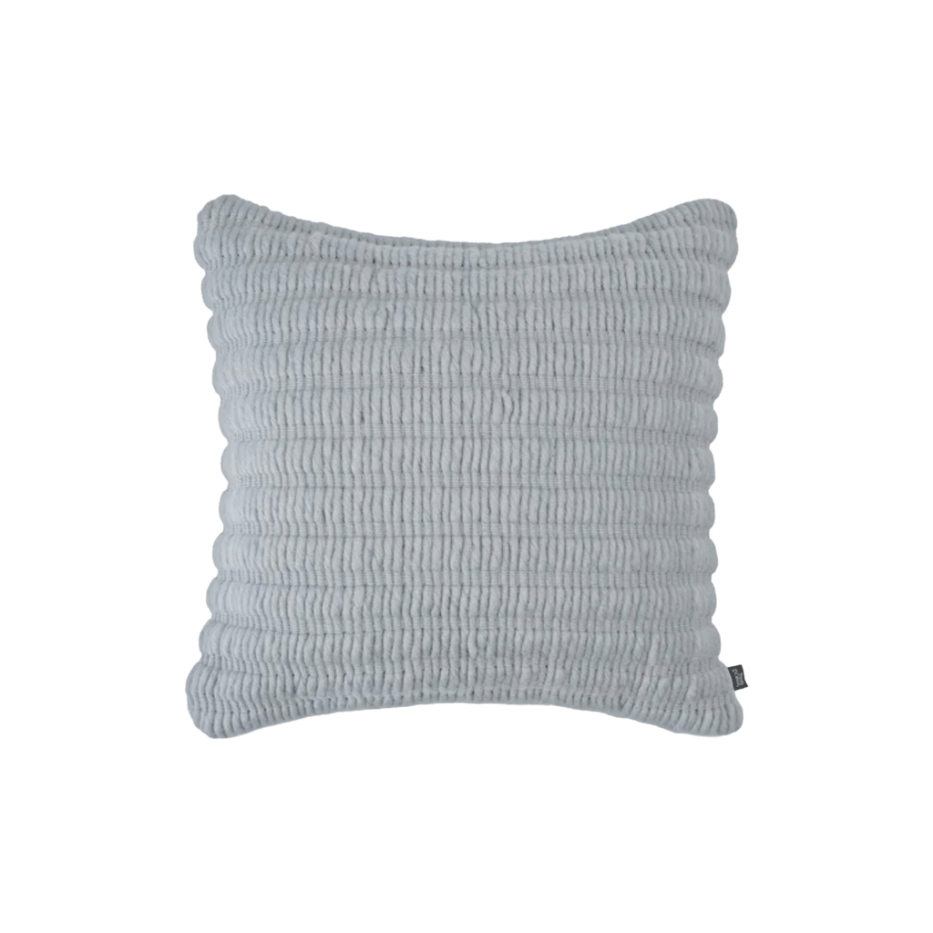 Luxury decorative cushion by Tom Dixon, handcrafted from New Zealand wool and cotton with a textured ridged design.