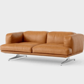 The &Tradition AV22 Inland 2 Seater Sofa combines Scandinavian elegance with luxurious cognac aniline leather, polished aluminium legs and exceptional everyday comfort.