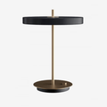 The Umage Asteria Table Lamp combines minimalist Scandinavian design with integrated LED lighting, a warm 3000K glow and a hidden USB charging port, making it ideal for desks, bedside tables and contemporary living spaces.