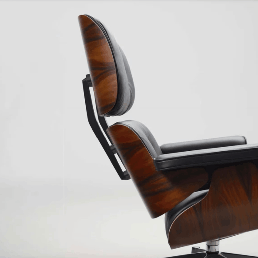 Wooden office chair with black armrests on a white background